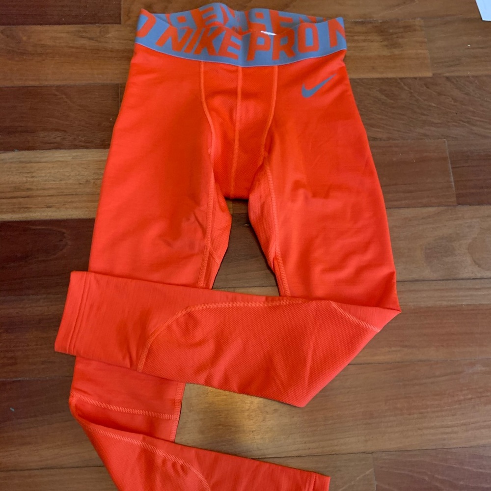 Nike orange full length leggings, size small